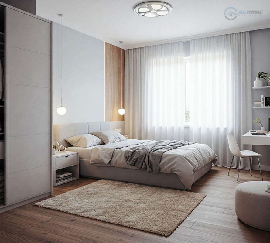 thiết kế phòng ngủ cho căn hộ 35m2 với rèm cửa mỏng, thảm trải sàn